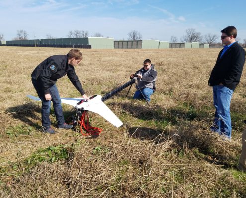 Landpoint team preparing drone for flight